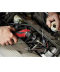 Person using Pointed Soldering Tip For 49-80-0400 Cordless Soldering Iron Model 2488-20 for wire repair in car engine