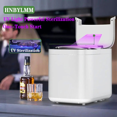 Self Cleaning Portable Countertop Ice Maker Spits Out Nine Bullet Cubes In Six Minutes With Smart Touch Panel And Two Liter Tank Perfect For Home Bars Offices And Rv Hangouts No Drama Just Frosty Vibes on a kitchen counter with whiskey.