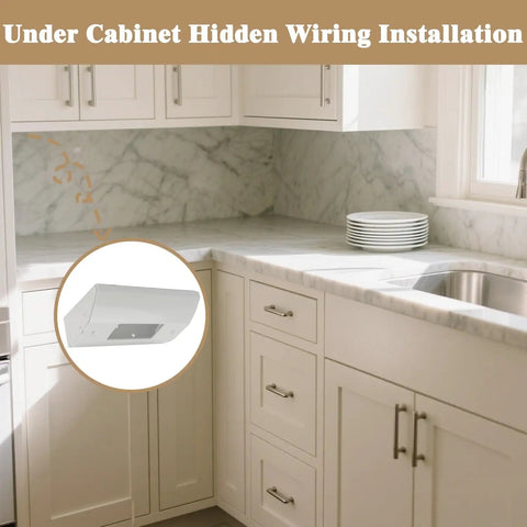 Corner Mount Power Distribution Box In White Nylon Slim Fit With Heavy Duty Metal Housing Pre Drilled Holes And Compact Wall Mount For Under Cabinet And Counter Installations Ideal For Residential And Light Commercial Use shown installed under a kitchen cabinet.