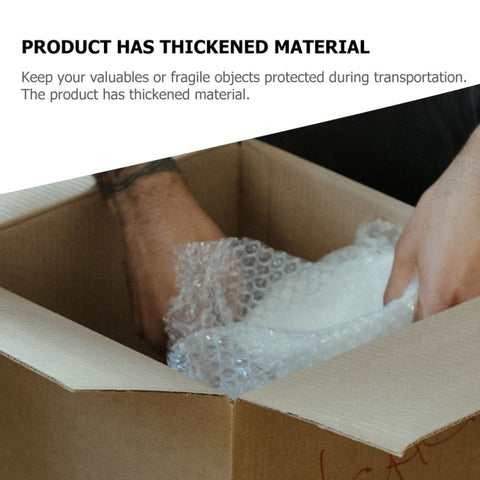 Person packing with thickened LDPE bubble wrap roll for moving and shipping, double-sided cushion film for ceramics and glass protection.