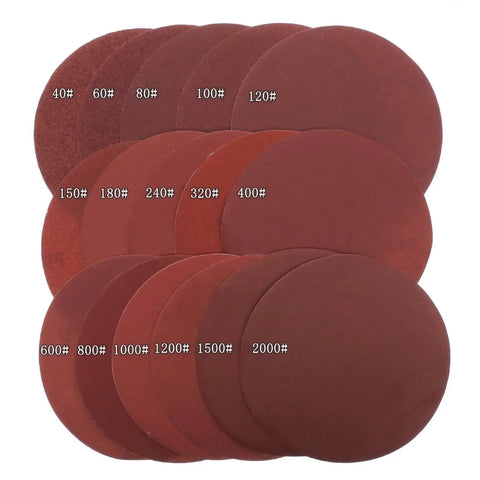 Get The 20 Piece Set Of Killer Six Inch Sanding Discs With Hook And Loop Backing For Heavy Work On Wood Metal And Composites In Super Durable Aluminum Oxide Abrasive Grits Like 80 120 And 240 To Smooth Everything Perfectly Fast - Assorted sanding discs with various grits from 40 to 2000.