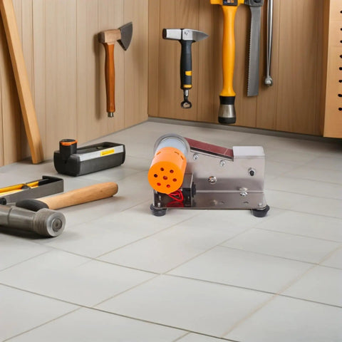 MAGICLULU High Torque Electric Mini Belt Sander With Efficient Heat Dissipation compact grinding machine on workspace floor.