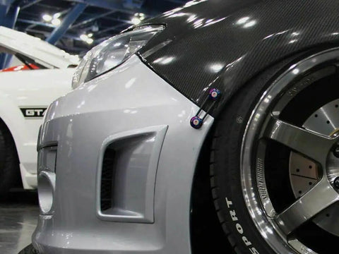 Close-up of car bumper with JDM Quick Release Fasteners Kit 8Pcs Billet Aluminum Locking Bolts installed, showcasing fitment.