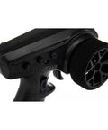 Close-up of the 3 Channel SLT Radio System With SR315 Dual Protocol Receiver For RC Cars And Trucks, focusing on the grip and controls.