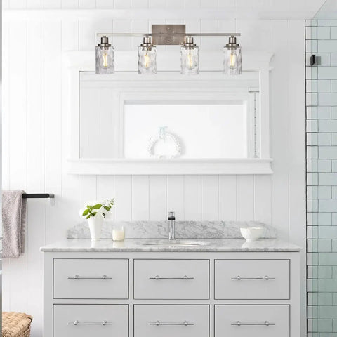4 Light Vanity Light Fixtures For Bathroom With Brushed Nickel Finish And Hammered Glass Shades above white bathroom sink