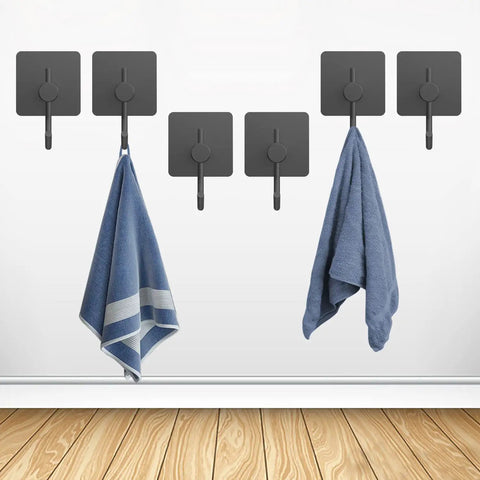 Heavy Duty J Shape Towel Hooks 6 Pack Black Aluminum Self Adhesive Wall Mounted Coat Robe Hooks For Bathroom And Shower Organization Durable Rust Resistant And Easy To Install showing two towels hanging