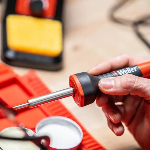 Hand holding lightweight pencil iron of 40 Watt Digital Soldering Station with Adjustable Power from 5W to 40W, Cushioned Foam Grip