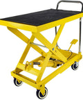 Yellow hydraulic lift table with rubber surface and wheels, designed for heavy-duty lifting. Visible are polyurethane wheels.