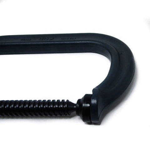 Beefy C Clamp With Eight And A Quarter Inch Opening And Four And Fifteen Sixteenths Inch Throat Delivers Six Thousand Nine Hundred Pound Clamping Force Drop Forged Frame ACME Rolled Spindle And V Grooved Anvil For Holding Rounds Squares And Flats Model, close-up of frame and spindle