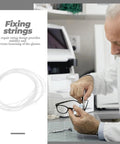 Man using Eyewear Repair String For Glasses Nylon Thread Quick Adjustment Tool on eyeglasses in workshop setting
