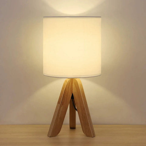 Cozy Kids Table Lamp With Fabric Shade And Wood Tripod Base, emits warm white glow, ideal for kids room or study
