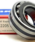 Tough As Nails 22205 E C3 Spherical Roller Bearing 25X52X18 Mm with open design and steel construction beside packaging.