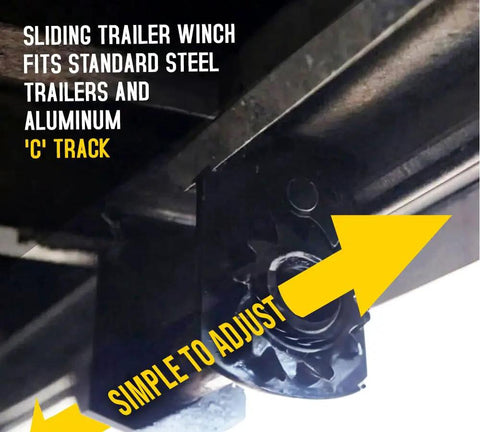 Sliding trailer winch for C track rail system, showing easy adjustment and secure fit for heavy duty tie down gear