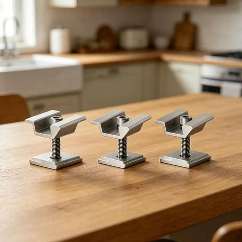 Rock Hard Solar Bracket Kits In 8 Pack Sets For Ground Mount Installations Using 45MM Medium Voltage Blocks And Conductive Sheets Made From Hella Tough Aluminum on a wooden table.