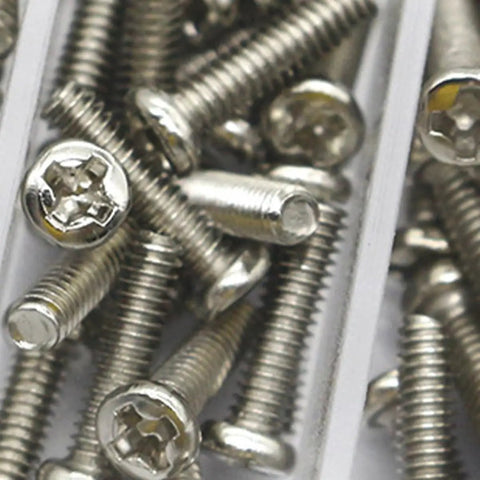 Close-up of Miniature Screw Kit Set With Silver Tiny Screws For Eyeglasses, Sunglasses And Watches, Glasses Repair Tools