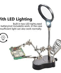 Desktop LED Magnifying Glass Soldering Station with PCB holder and LED lighting, showing 3.5X and 12X magnification lenses.