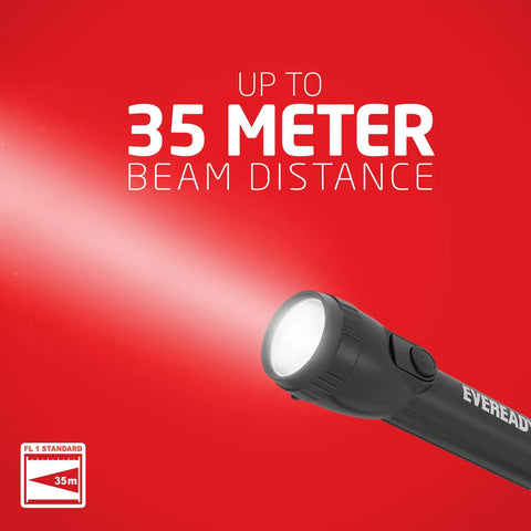 8 Pack LED Flashlights With Batteries Included shining beam 35 meters on red background, showcasing its long-distance capability.
