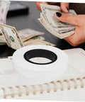 Heavy Duty Cash Strapping Tape Roll on desk for banknote bundling and shipping, fast secure paper tape for bank use, logistics