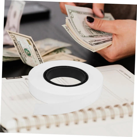 Heavy Duty Cash Strapping Tape Roll on desk for banknote bundling and shipping, fast secure paper tape for bank use, logistics