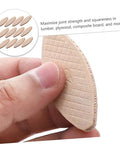 Close-up of a beech wood biscuit from 100 Pcs Wood Joining Biscuits Beech Wood Board Connection Kit For Tenon Machines And Biscuit Joiners DIY Carpentry And Woodworking Gear For Strong Joints In Furniture Framing And Projects held in hand