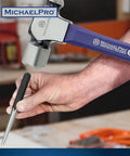 Person using a hammer with a center punch from Heavy Duty Punch and Chisel Kit, 16-Piece Set With Center Punches.