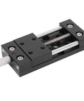 Built Tough Aluminum X Axis Sliding Table With Precision Manual Knobs For Micro Adjustments And Smooth As Silk Fine Tuning on a black aluminum linear slide stage.