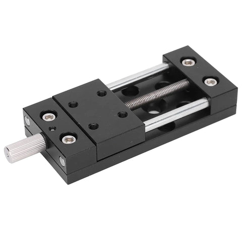 Built Tough Aluminum X Axis Sliding Table With Precision Manual Knobs For Micro Adjustments And Smooth As Silk Fine Tuning on a black aluminum linear slide stage.