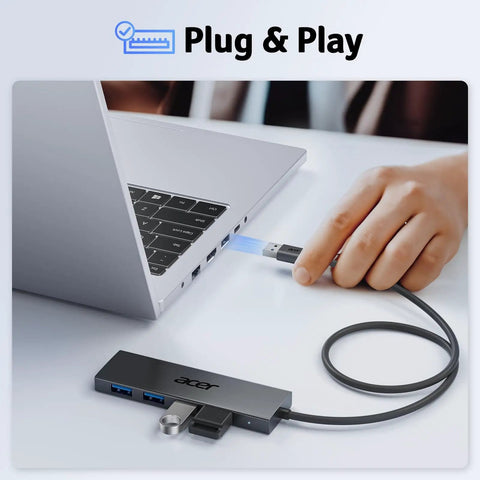 Person plugging Four Port USB 3.0 Hub With 5Gbps Transfer, Laptop And PC Extender, Power Port Enabled, into a laptop