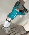 18V LXT Cordless Straight Metal Shear With Brushless Motor cutting metal, close-up view of dual cut blade in action