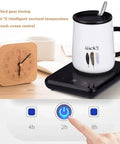 Keep That Coffee Strong Desk Cup Warmer With Steady 55 Degree Thermostat, black tray with white mug and spoon.