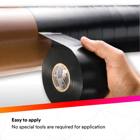 Vinyl Corrosion Protection Tape 50 Unprinted 2 In X 100 Ft Black Roll Premium Grade 10 Mil Thick High Tack All Weather RoHS Compliant For Metal Piping Systems being applied to a pipe by hand