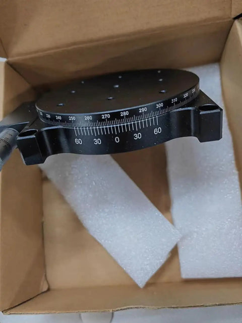 Manual R Axis Rotary Stage With 360 Degree Rotation For Dope Micro Adjustment, shown in packaging, with pro grade micrometer head.