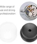 Pro Grade Mainspring Barrel Close Tool For Watch Repair with closed tool, visible black plastic body and open watch movement.