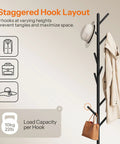 Coat Rack With Nine Hooks Freestanding Metal Hall Tree With Wooden Base For Entryway Space Saving Coat Hanger in use