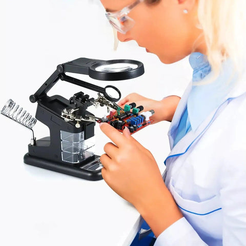 Person using USB Electric Soldering Clamp With 10 LED Magnifying Desk Lamp For Electronics Repair Adjustable Third Hand Tool