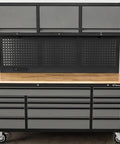 Heavy Duty Rolling Tool Chest Featuring 14 Lockable Drawers And Three Secure Cabinets Built For Serious Garage Organization And No Nonsense Shop Stash with wood top and pegboard.