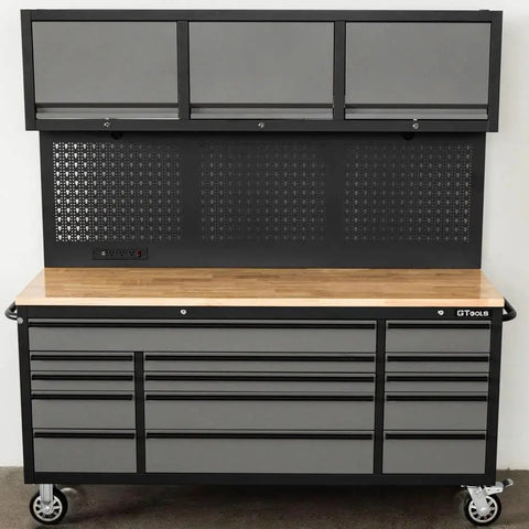 Heavy Duty Rolling Tool Chest Featuring 14 Lockable Drawers And Three Secure Cabinets Built For Serious Garage Organization And No Nonsense Shop Stash with wood top and pegboard.