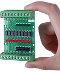 Hand holding 8 Channel Isolation Module for DC 12V 24V Power and Control Signals, PNP NPN Low High Level Output, Plug and Play Converter