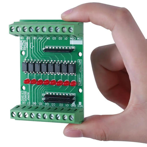 Hand holding 8 Channel Isolation Module for DC 12V 24V Power and Control Signals, PNP NPN Low High Level Output, Plug and Play Converter