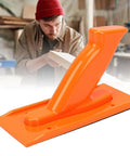 Heavy Duty Non Slip Woodworking Push Block And Safety Push Stick With Ergonomic Tilted Handle on a workbench, bright orange ABS material.