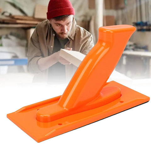 Heavy Duty Non Slip Woodworking Push Block And Safety Push Stick With Ergonomic Tilted Handle on a workbench, bright orange ABS material.