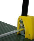Close-up of the yellow hinge mechanism on the Tough As Nails Foldable Push Cart Dolly for enhanced durability.