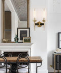 Two-Light Gold Brass Wall Sconces With 2.8 Inch Cylindrical Clear Glass Shades, Dimmable, E26 Base Compatible in dining room