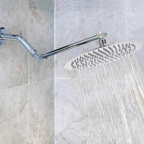 12 Inch Rainfall Shower Head With 11 Inch Brass Adjustable Arm High Pressure Stainless Steel Chrome Finish Ultra Thin Design Elevate Your Bathroom With Boss Level Spa Vibe And Full Body Coverage Through 140 Plus Outlets installed on marble wall