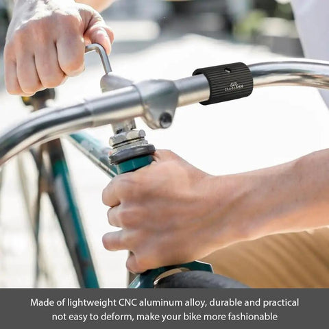 Person adjusting bike handlebar with Bike Handlebar Shim Set 1 Pair 25.4 To 31.8 Mm Aluminum Alloy Clamp Spacer Conversion Adapter.
