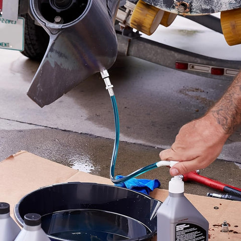 Lower Unit Gear Oil Pump Outboard Oil Change Kit With Three Eighths Inch Metal Swivel And 8mm And 10mm Adapters in use on boat