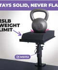 Angled Studio Monitor Isolation Pads For Speakers Five Inch High Density Foam Riser holding 25lb weight on desk setup.