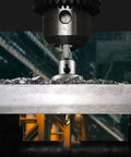 Close-up of Beefy Built Tough Tungsten Carbide Tipped Hole Saw Kit cutting stainless steel, metal shavings visible