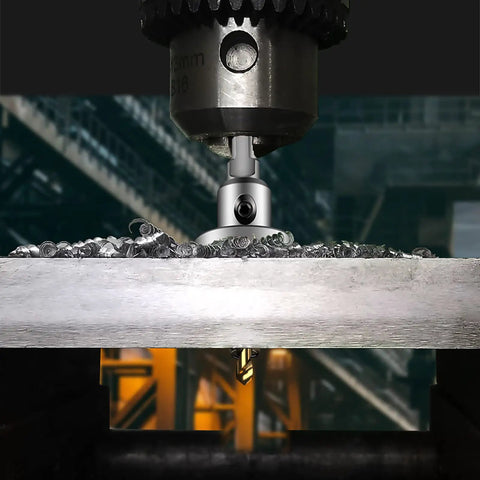 Close-up of Beefy Built Tough Tungsten Carbide Tipped Hole Saw Kit cutting stainless steel, metal shavings visible