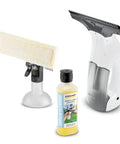 Front view of Kärcher WV 1 electric window vacuum squeegee with 10-inch blade, white and gray body, plus pad on stand and cleaning bottle.